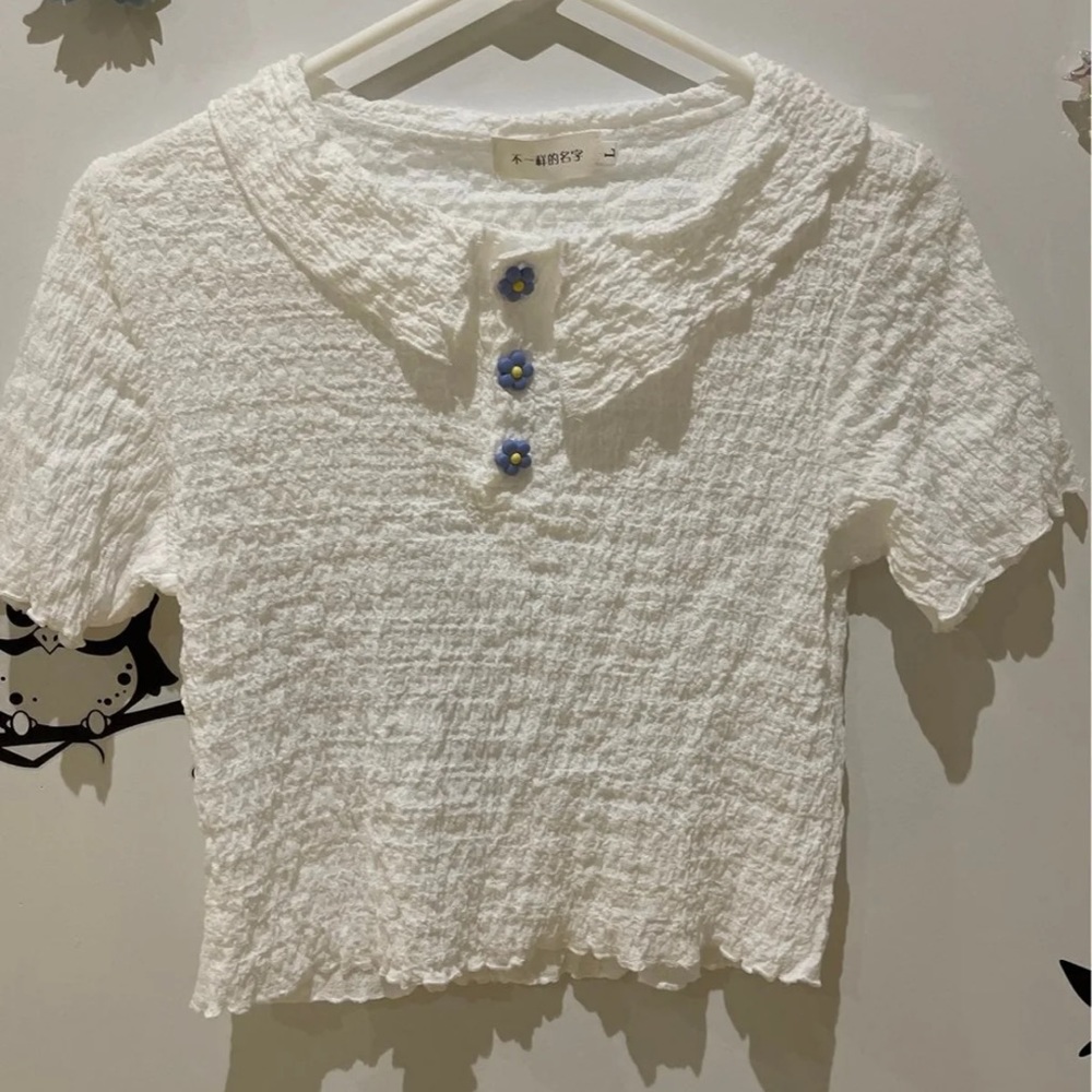 Blue flower buttons top
